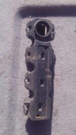 Used valve cover for Opel Corsa 1.6, shown from top angle highlighting bolt holes and gasket area.Used valve c