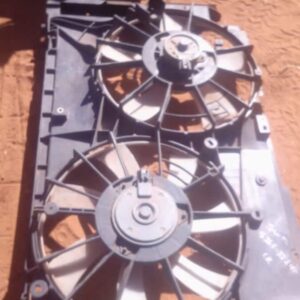 Used radiator cooling fan assembly viewed from front, showing fan blades and mounting points.Used radiator coo