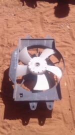 Front view of a used Ssangyong Musso 2.9 radiator fan with visible blades and motor assembly.Front view of a u