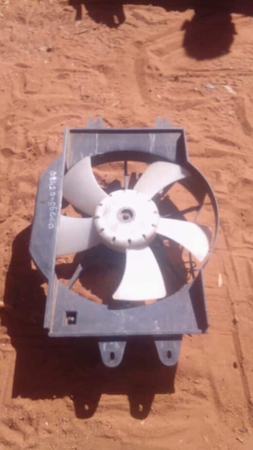 Ssangyong Musso 2.9 Radiator Fan - Used Front view of a used Ssangyong Musso 2.9 radiator fan with visible blades and motor assembly.Front view of a u
