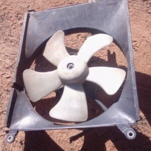 Front view of a used radiator fan for a 2008 Daihatsu Sirion showing blades and housing assembly.Front view of