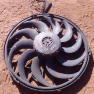 Used BMW E36 radiator fan assembly viewed front-on, showing blades and mounting frame clearly.Used BMW E36 rad