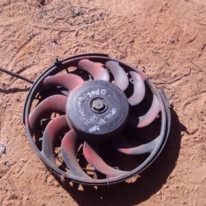Used radiator fan assembly for Opel Kadet, front view showing fan blades and motor housing.Used radiator fan a