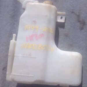 Front view of a used washer bottle for a Nissan Hardbody, showing overall shape and connector details.Front vi