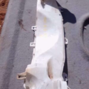 Front view of a used 2.8 CDR washer bottle for Dodge Nitro showing inlet and mounting points.Front view of a u