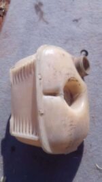 Side view of a used blue water bottle with Volkswagen Golf 3 logo, angled slightly to the left.Side view of a