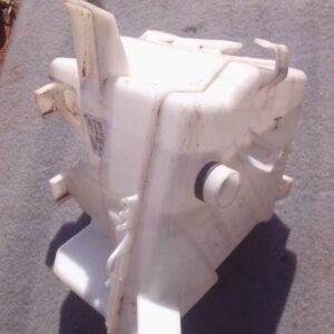 Front view of a used windshield washer bottle for Toyota Corolla, showing mounting points and cap.Front view o