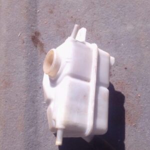 Side view of used 2008 Chevrolet Aveo water bottle with hose connector and mounting bracket visible.Side view