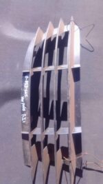 Left front headlight cover for Volkswagen Golf 5, shown from front angle, used condition.Left front headlight