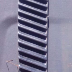 Left rear vent for Volkswagen Microbus shown from angled side, used condition visible.Left rear vent for Volks
