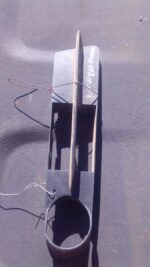 Right side spotlight cover for BMW E60, shown from front angle, used condition.Right side spotlight cover for