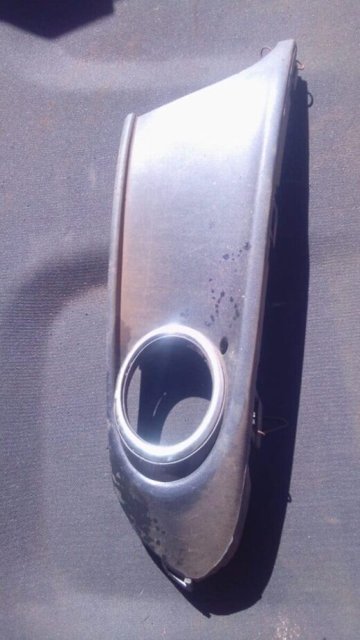2014 Volkswagen Polo Right Spotlight Cover - Used Right spotlight cover for 2014 Volkswagen Polo, used, shown from front angle on a white background.Right spotl
