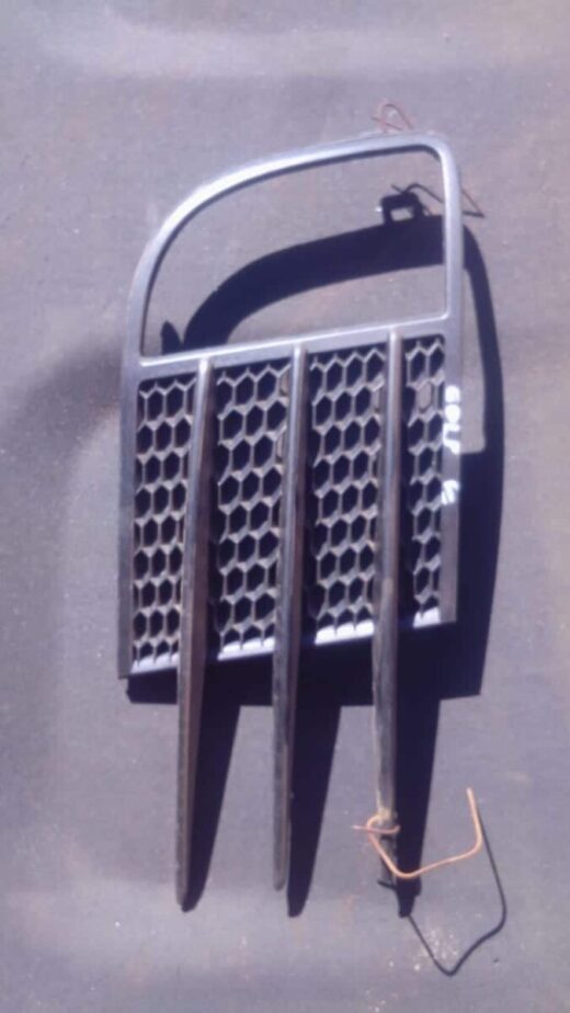 Volkswagen Golf 6 Right Spotlight Cover - Used Right side spotlight cover for Volkswagen Golf 6, used, shown from a front angle.Right side spotlight cover fo