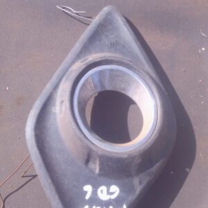 Right side spotlight cover for Toyota Corolla, used condition, shown against a plain background.Right side spo