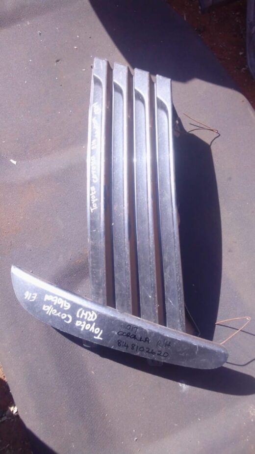 2017 Toyota Corolla Right Spotlight Cover - Used Right-side car spotlight cover for Toyota Corolla, shown front angle, used condition with minor wear.Right-sid
