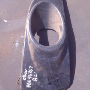 Right headlight spotlight cover for 2013 Chevrolet Aveo shown from front angle, used condition.Right headlight