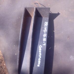 Left front spotlight cover for Saab shown from front angle, used condition visible with minor wear.Left front