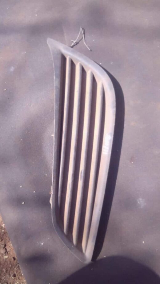 2016 Opel Astra Right Spotlight Cover - Used Right-side headlight spotlight cover for Opel Astra, viewed front-on, used condition.Right-side headlight spot