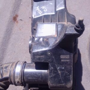 Used air filter housing for Nissan Tiida, shown from a top angle displaying connection points and seals.Used a