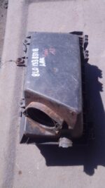 Used Audi A3 air filter housing shown from front left angle on white background.Used Audi A3 air filter housin