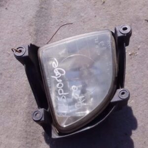 Right headlight spotlight assembly for Kia Sportage, used, shown from front angle.Right headlight spotlight as