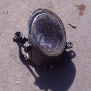 Front view of a used Audi A4 B7 headlight assembly with clear lens and chrome housing.Front view of a used Aud