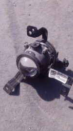 Left front headlight for Hyundai i10, used condition, shown from a three-quarter frontal angle.Left front head