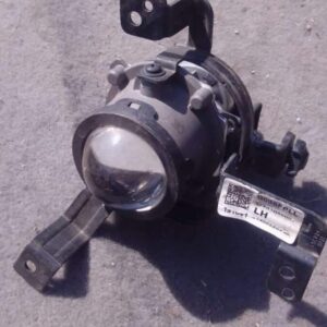 Left front headlight for Hyundai i10, used condition, shown from a three-quarter frontal angle.Left front head
