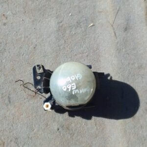 Used right-side spotlight for BMW E60 shown from front angle with visible mounting bracket.Used right-side spo