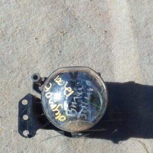 Left front spotlight for BMW E60, shown angled from front-left side, used condition visible.Left front spotlig