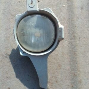 Right side spotlight for 2013 Toyota Hilux, used condition, shown angled slightly from front view.Right side s