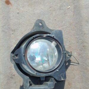Left side spotlight for Toyota Hilux, shown front angle, used condition.Left side spotlight for Toyota Hilux,
