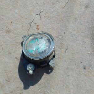 Left front spotlight for Mini Cooper R50, used condition, shown from front angle on neutral background.Left fr