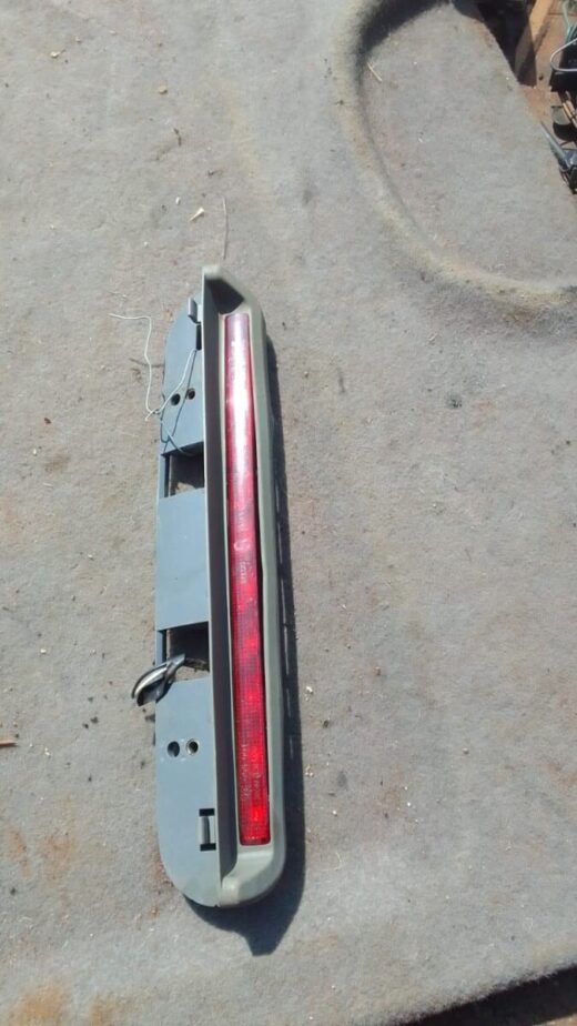 Fiat Grand Sienna 3Rd Brake Light - Used Rear view of used third brake light for Fiat Grand Sienna positioned for roof mounting.Rear view of used third