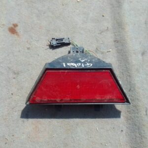 Rear view of a used third brake light for a BMW E36, shown installed on the vehicle’s rear window.Rear view of