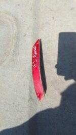 Right rear reflector for Haval M4, used condition, shown at slight angle on white background.Right rear reflec