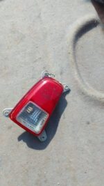 Left rear fog light for Kia Picanto shown from the back with wiring, used condition.Left rear fog light for Ki