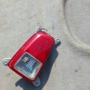 Left rear fog light for Kia Picanto shown from the back with wiring, used condition.Left rear fog light for Ki