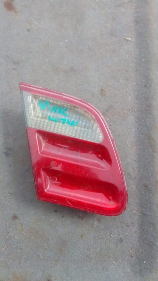 Mercedes W210 Left Inner Taillight - Used Left inner taillight for Mercedes W210 shown front angled view, used condition.Left inner taillight for Merced