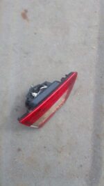 Left inner taillight for Renault Clio 4 shown front-facing on white background, used condition.Left inner tail
