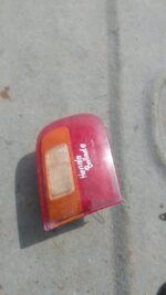 Right inner taillight for 1995 Honda Ballade, used, shown from rear angle on white background.Right inner tail