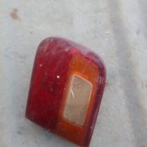 Right inner taillight for Honda Ballade, viewed front-on, used condition showing light wear.Right inner tailli