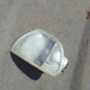 Left corner light for Fiat Palio viewed from front left, used condition, showing clear lens and amber reflecto