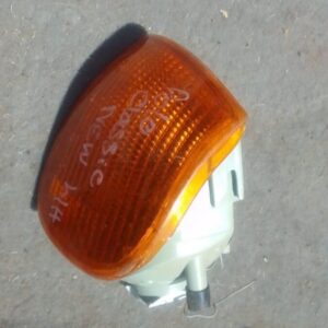 Left corner light for Volkswagen Polo Classic, used, shown from front angle on white background.Left corner li