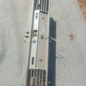 Center dashboard air vent for BMW E36, front view, used condition.Center dashboard air vent for BMW E36, front