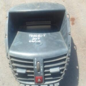Used center dash air vent for Peugeot 207, shown front view with mounting details visible.Used center dash air