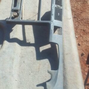 Centre dash air vent for 1995 Toyota Conquest, front view, used condition with vents and mounting clips visibl