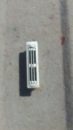 Rear roof air vent for Volkswagen Transporter T4, used condition, shown from top side angle.Rear roof air vent