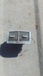 Rear central air vent for Audi A6 shown from the back, used condition with mounting clips visible.Rear central