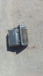 Right side dashboard air vent for Toyota Runx, used condition, shown from front angle.Right side dashboard air